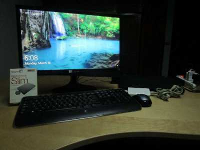 Lenovo T430 with dock, monitor, USB keyboard, external drive.