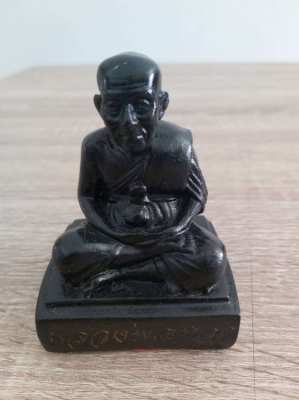 A Thaibronze state of a monk L.P Tuad