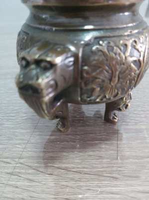 Chinese bronze insence burner with foo dog finial and mark to base