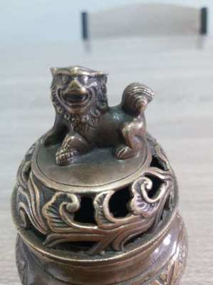 Chinese bronze insence burner with foo dog finial and mark to base