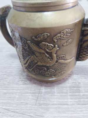 Beautifull bronze teapot decorated with dragons