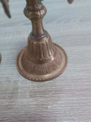 A pair of old Indian candle holders