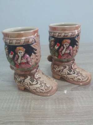 A pair of porcelain  shoes same design as german beer steims