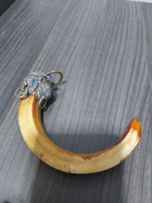 Chinese bovine horn item could be used as a keyring price includes del