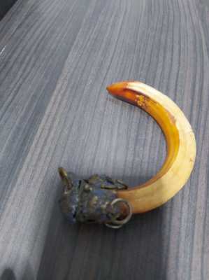 Chinese bovine horn item could be used as a keyring price includes del