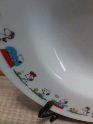 Five boxed snoopy cereal bowls by united feature syndicate  