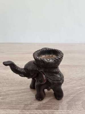 Lovely old thai elephant candle holder