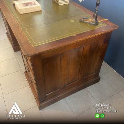 Antique English bureau with green leather top and 8 drawers