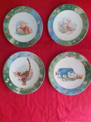 Set of four simply Pooh plates in box pooh,piglet,tigger and eeyore