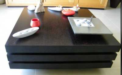 Three swivel trays coffee table