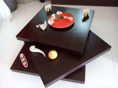 Three swivel trays coffee table