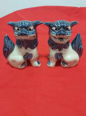 A superb pair of chinese/japanese blue and white foo/fo dogs