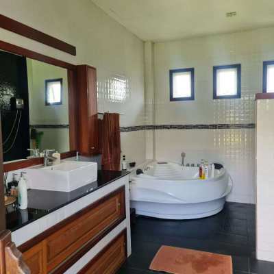 Roomy detached villa with a private pool for sale.