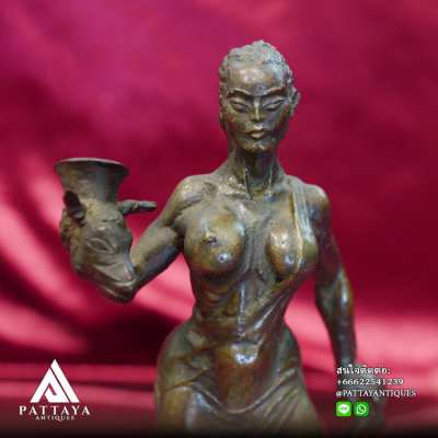 Antique Bronze statue of Lady holding a rams head cup