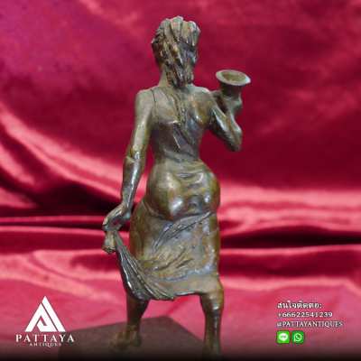 Antique Bronze statue of Lady holding a rams head cup