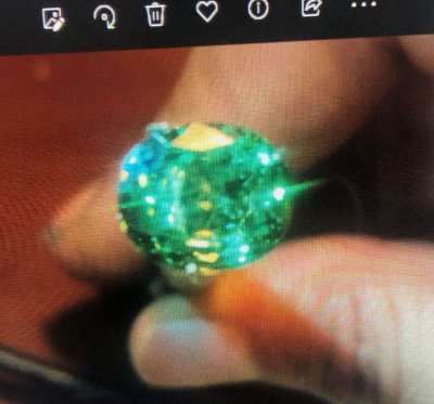 Gold ring whit Demantoid Garnet and diamond