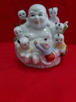 Lovely chinese happy budha with 7 children playing great condition