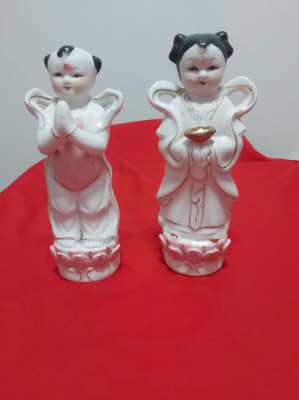 Two lovely chinese figures fortune boy and dragon girl lovely items