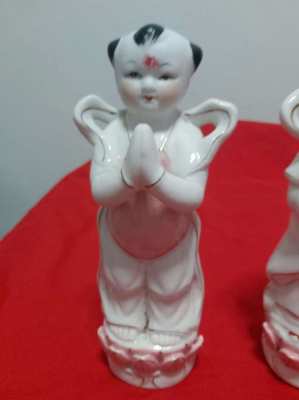 Two lovely chinese figures fortune boy and dragon girl lovely items