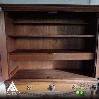 An Antique Dutch Colonial Oak Twisted Cross-Legged Cabinet