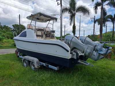 Catamaran 2 x 90 hp with cabin, well maintained