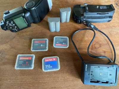 Nikon D700, lenses, flashlight, memorycards, 3-pod and complete studio