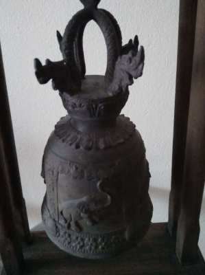 Old Thai bell on its wooden stand