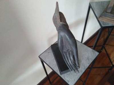 Buddha's hand on wooden base