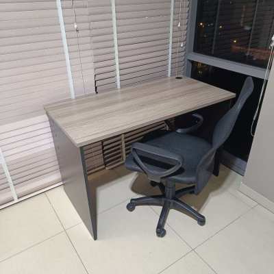 Two computer desks and a chair