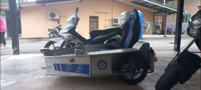 Suzuki Spark with sidecar for sale.