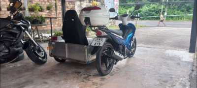 Suzuki Spark with sidecar for sale.